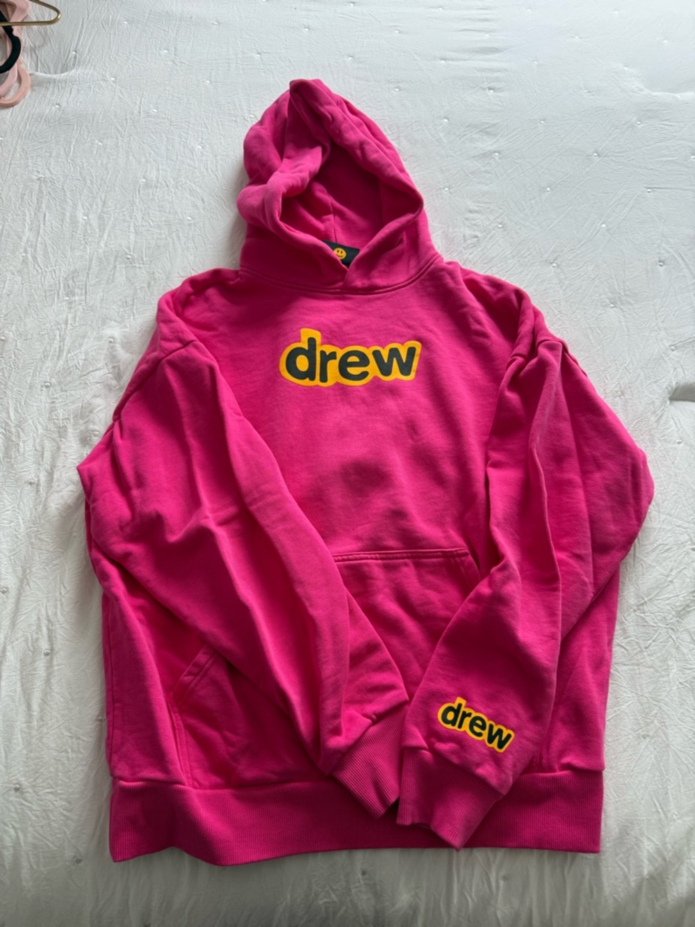 drew house bright pink hoodie with yellow logo